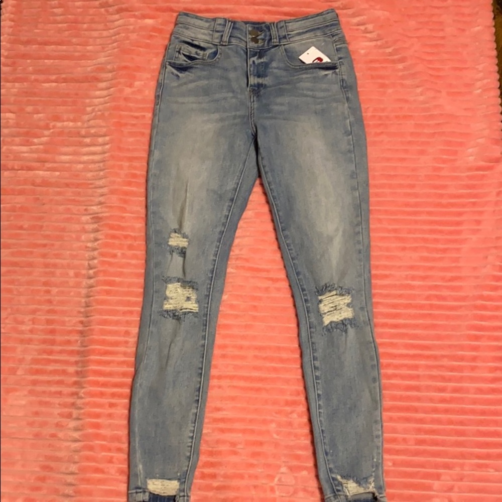high rise buckle jeans